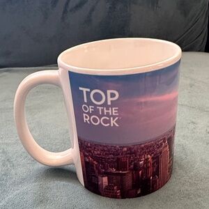 New York City Skyline Mug—Top of the Rock—Sunset photograph. White and Purple